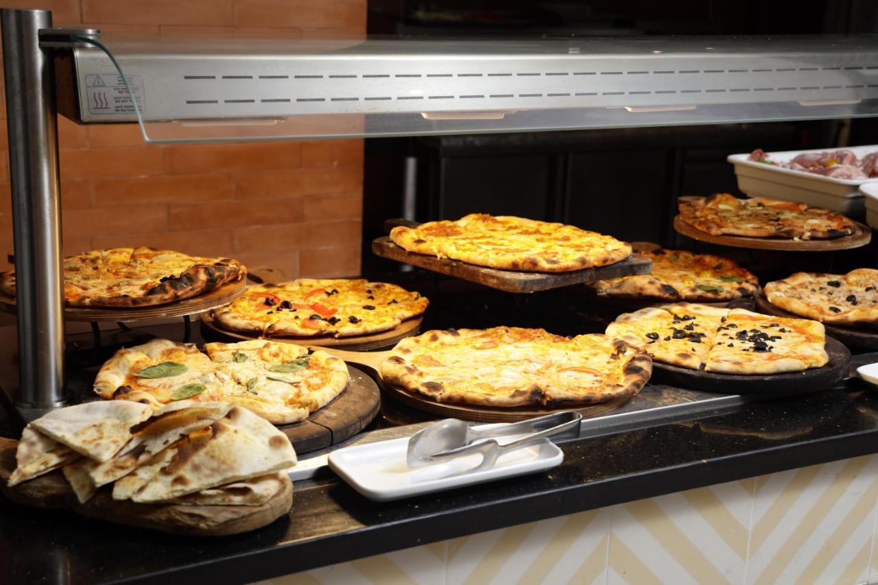 The Mirage Resort & Spa Hammamet Luaran gambar A display of pies at a bakery